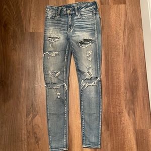 American Eagle Super Stretch Jeans with holes